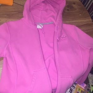 A pink Nike Small (4-6) women’s  jacket